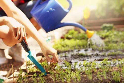 Gardeners working safely in a Westcombe Park garden