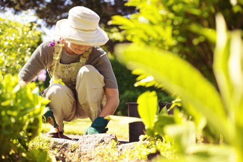Team member wearing PPE during garden maintenance